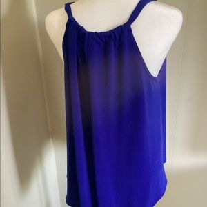 Medium blue tank shirt. Good for any occasion. Worn a couple of times